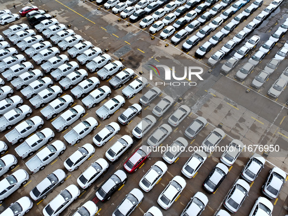 A large number of vehicles are collected for shipment at the port of Lianyungang in Jiangsu province, China, on October 18, 2024. 