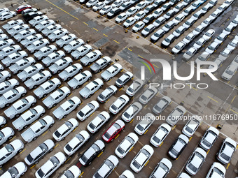 A large number of vehicles are collected for shipment at the port of Lianyungang in Jiangsu province, China, on October 18, 2024. (