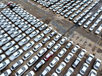 A large number of vehicles are collected for shipment at the port of Lianyungang in Jiangsu province, China, on October 18, 2024. (