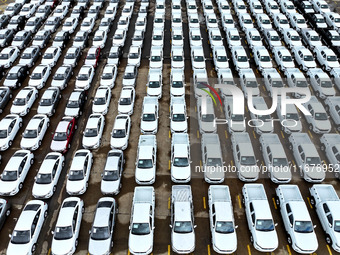 A large number of vehicles are collected for shipment at the port of Lianyungang in Jiangsu province, China, on October 18, 2024. (