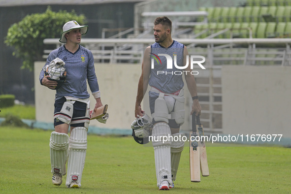 South African cricketers Matthew Breetzke (left) and captain Aiden Markram attend a practice session at the Sher-e-Bangla National Cricket S...