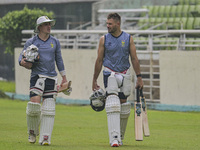 South African cricketers Matthew Breetzke (left) and captain Aiden Markram attend a practice session at the Sher-e-Bangla National Cricket S...