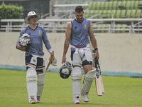 South African cricketers Matthew Breetzke (left) and captain Aiden Markram attend a practice session at the Sher-e-Bangla National Cricket S...