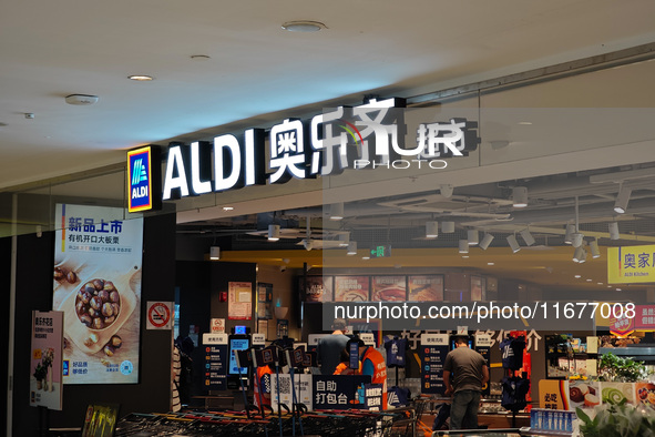 Customers shop at an ALDI supermarket in Shanghai, China, on October 18, 2024. 