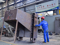 A worker works in a mechanical manufacturing enterprise in Qingzhou, China, on October 18, 2024. On the same day, the National Bureau of Sta...