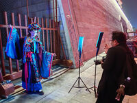 Tourists dressed in Hanfu visit the ancient city of Luoyi in Luoyang, Henan province, China, on October 16, 2024. (