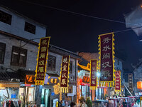 Tourists dressed in Hanfu visit the ancient city of Luoyi in Luoyang, Henan province, China, on October 16, 2024. (