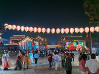 Tourists dressed in Hanfu visit the ancient city of Luoyi in Luoyang, Henan province, China, on October 16, 2024. (