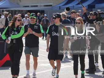 Guanyu Zhou of China drives the (24) Stake F1 Team Kick Sauber C44 Ferrari, and Valtteri Bottas of Finland drives the (77) Stake F1 Team Kic...