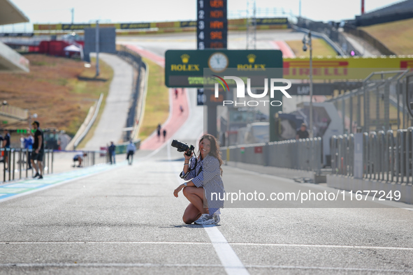 A photographer is on the pit lane during the Formula 1 Pirelli United States Grand Prix 2024 in Austin, USA, on October 17, 2024. 