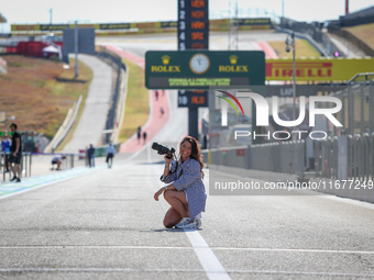 A photographer is on the pit lane during the Formula 1 Pirelli United States Grand Prix 2024 in Austin, USA, on October 17, 2024. (