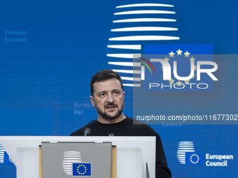 President of Ukraine Volodymyr Zelenskyy addresses a press conference during his visit at the European Council Summit, the EU leaders meetin...