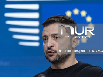 President of Ukraine Volodymyr Zelenskyy addresses a press conference during his visit at the European Council Summit, the EU leaders meetin...