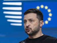 President of Ukraine Volodymyr Zelenskyy addresses a press conference during his visit at the European Council Summit, the EU leaders meetin...