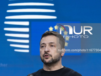 President of Ukraine Volodymyr Zelenskyy addresses a press conference during his visit at the European Council Summit, the EU leaders meetin...