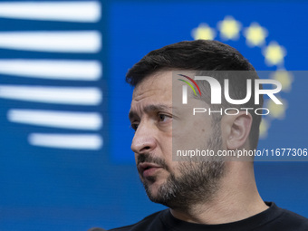 President of Ukraine Volodymyr Zelenskyy addresses a press conference during his visit at the European Council Summit, the EU leaders meetin...