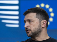 President of Ukraine Volodymyr Zelenskyy addresses a press conference during his visit at the European Council Summit, the EU leaders meetin...