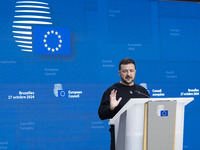 President of Ukraine Volodymyr Zelenskyy addresses a press conference during his visit at the European Council Summit, the EU leaders meetin...