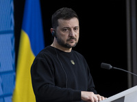 President of Ukraine Volodymyr Zelenskyy addresses a press conference during his visit at the European Council Summit, the EU leaders meetin...