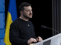 President of Ukraine Volodymyr Zelenskyy addresses a press conference during his visit at the European Council Summit, the EU leaders meetin...