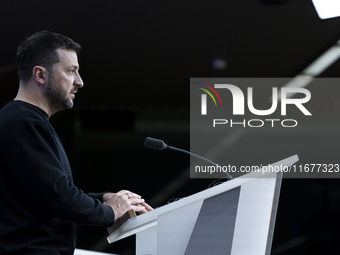 President of Ukraine Volodymyr Zelenskyy addresses a press conference during his visit at the European Council Summit, the EU leaders meetin...