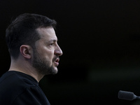 President of Ukraine Volodymyr Zelenskyy addresses a press conference during his visit at the European Council Summit, the EU leaders meetin...