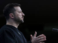 President of Ukraine Volodymyr Zelenskyy addresses a press conference during his visit at the European Council Summit, the EU leaders meetin...