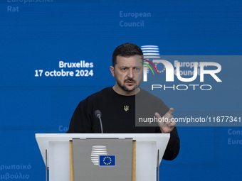 President of Ukraine Volodymyr Zelenskyy addresses a press conference during his visit at the European Council Summit, the EU leaders meetin...