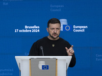 President of Ukraine Volodymyr Zelenskyy addresses a press conference during his visit at the European Council Summit, the EU leaders meetin...