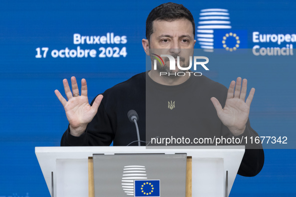 President of Ukraine Volodymyr Zelenskyy addresses a press conference during his visit at the European Council Summit, the EU leaders meetin...