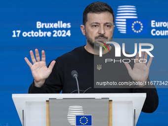 President of Ukraine Volodymyr Zelenskyy addresses a press conference during his visit at the European Council Summit, the EU leaders meetin...