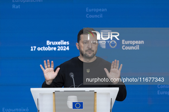 President of Ukraine Volodymyr Zelenskyy addresses a press conference during his visit at the European Council Summit, the EU leaders meetin...