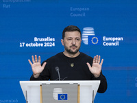 President of Ukraine Volodymyr Zelenskyy addresses a press conference during his visit at the European Council Summit, the EU leaders meetin...