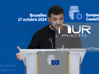 President of Ukraine Volodymyr Zelenskyy addresses a press conference during his visit at the European Council Summit, the EU leaders meetin...