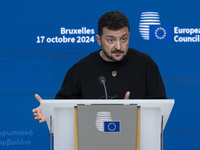 President of Ukraine Volodymyr Zelenskyy addresses a press conference during his visit at the European Council Summit, the EU leaders meetin...