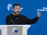 President of Ukraine Volodymyr Zelenskyy addresses a press conference during his visit at the European Council Summit, the EU leaders meetin...