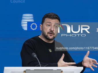 President of Ukraine Volodymyr Zelenskyy addresses a press conference during his visit at the European Council Summit, the EU leaders meetin...