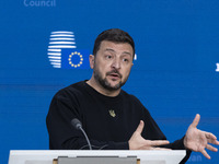 President of Ukraine Volodymyr Zelenskyy addresses a press conference during his visit at the European Council Summit, the EU leaders meetin...