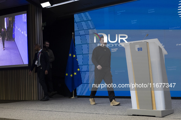 President of Ukraine Volodymyr Zelenskyy addresses a press conference during his visit at the European Council Summit, the EU leaders meetin...