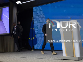 President of Ukraine Volodymyr Zelenskyy addresses a press conference during his visit at the European Council Summit, the EU leaders meetin...