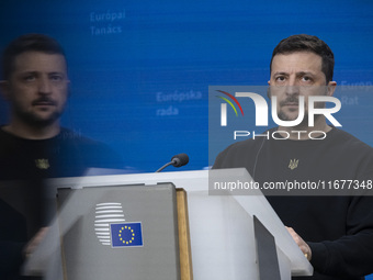 President of Ukraine Volodymyr Zelenskyy addresses a press conference during his visit at the European Council Summit, the EU leaders meetin...