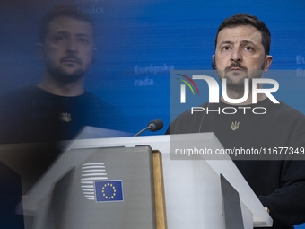 President of Ukraine Volodymyr Zelenskyy addresses a press conference during his visit at the European Council Summit, the EU leaders meetin...