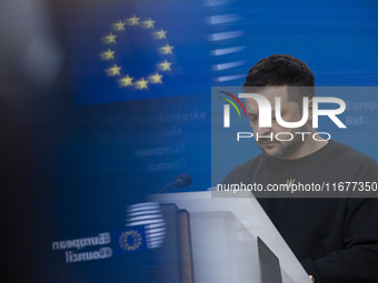 President of Ukraine Volodymyr Zelenskyy addresses a press conference during his visit at the European Council Summit, the EU leaders meetin...