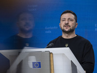 President of Ukraine Volodymyr Zelenskyy addresses a press conference during his visit at the European Council Summit, the EU leaders meetin...