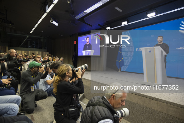 President of Ukraine Volodymyr Zelenskyy addresses a press conference during his visit at the European Council Summit, the EU leaders meetin...