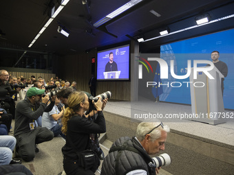 President of Ukraine Volodymyr Zelenskyy addresses a press conference during his visit at the European Council Summit, the EU leaders meetin...