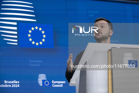 President of Ukraine Volodymyr Zelenskyy addresses a press conference during his visit at the European Council Summit, the EU leaders meetin...