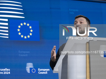 President of Ukraine Volodymyr Zelenskyy addresses a press conference during his visit at the European Council Summit, the EU leaders meetin...