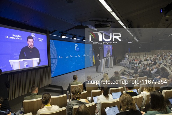 President of Ukraine Volodymyr Zelenskyy addresses a press conference during his visit at the European Council Summit, the EU leaders meetin...