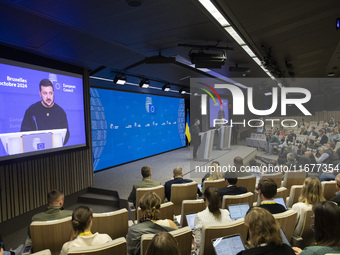 President of Ukraine Volodymyr Zelenskyy addresses a press conference during his visit at the European Council Summit, the EU leaders meetin...